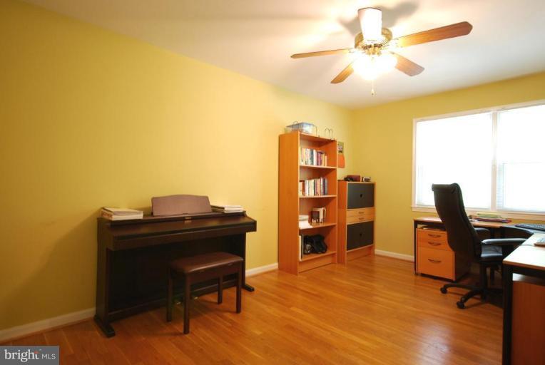 10728 Midsummer Drive Reston, VA 20191 - Photo 18 of 21 a view of a workspace with furniture and a window