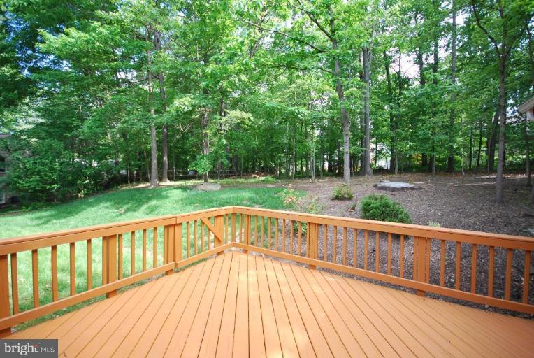 10728 Midsummer Drive Reston, VA 20191 - Photo 3 of 21 a view of deck with a large trees