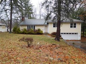33 Windingwood Road North Rye Brook, NY 10573 - Photo 1 of 1 front view of a house with a yard