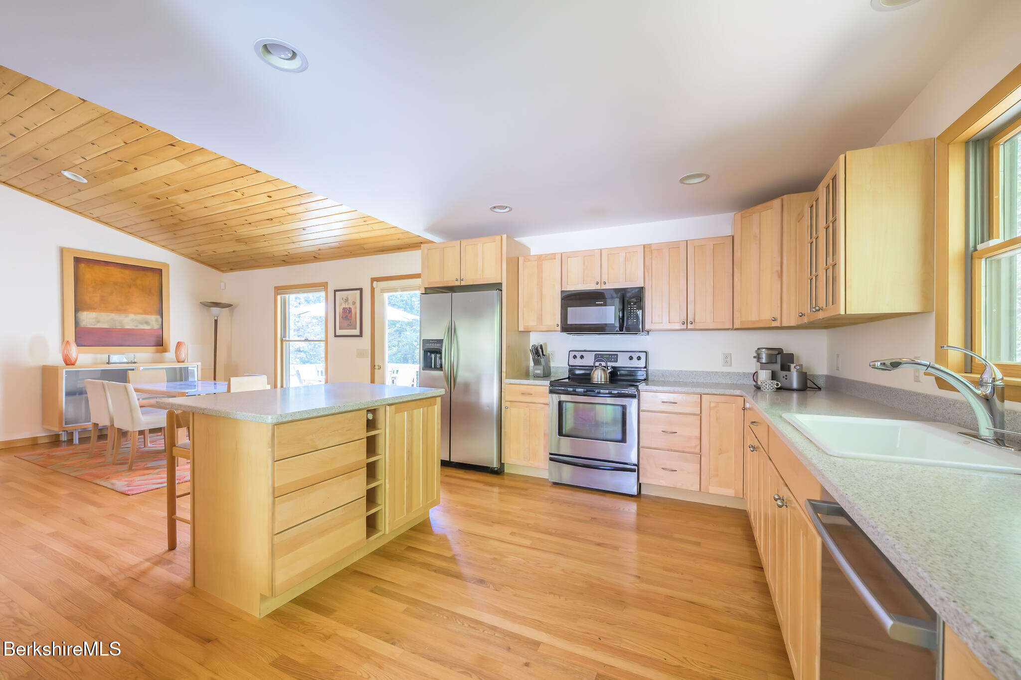 545 West Center Road Otis, MA 01253 - Photo 24 of 60 a kitchen with stainless steel appliances granite countertop a refrigerator sink and cabinets