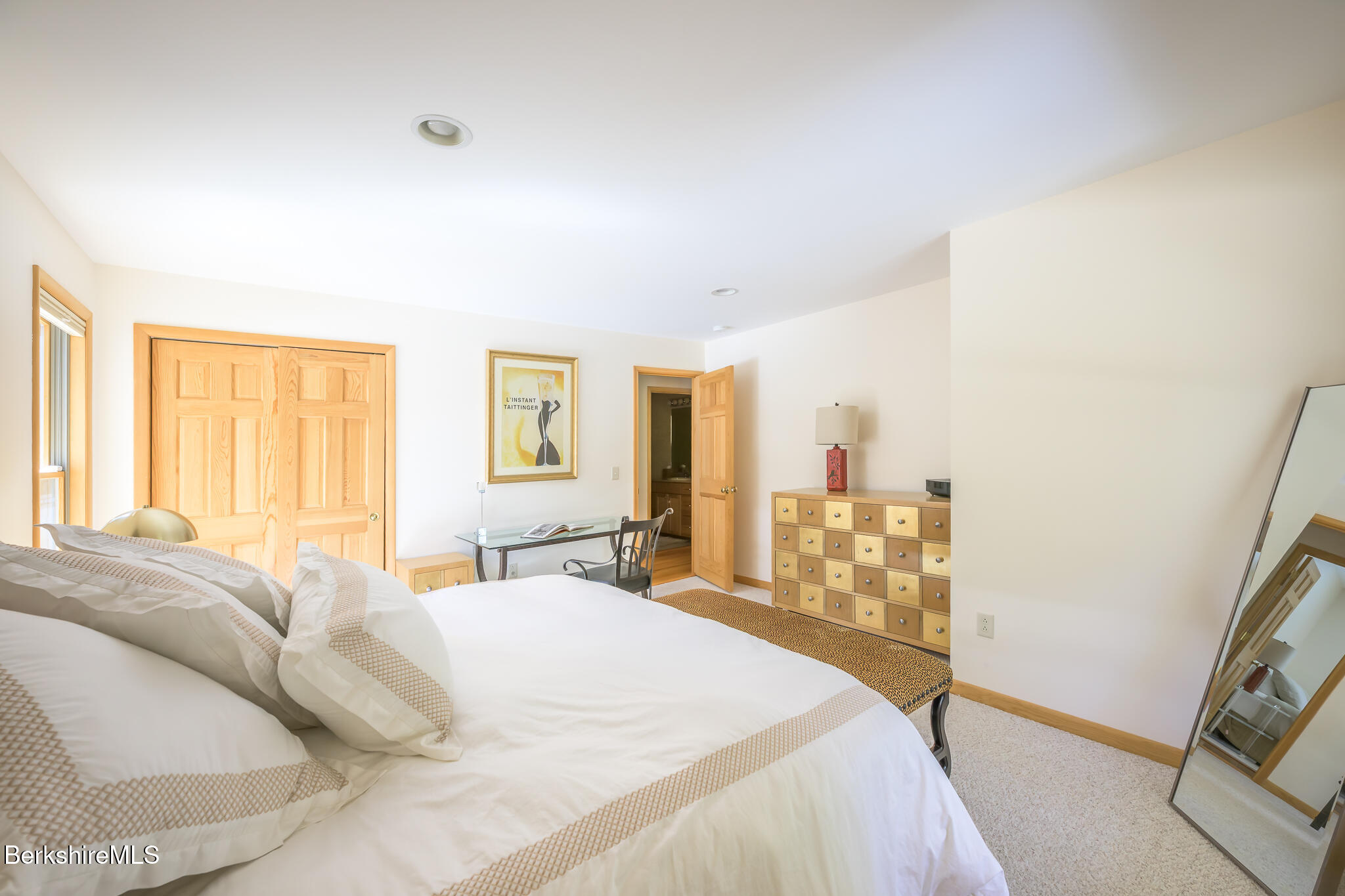 545 West Center Road Otis, MA 01253 - Photo 28 of 60 a bedroom with a bed and a window