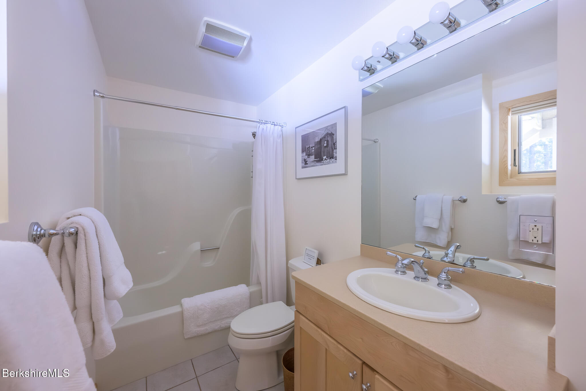 545 West Center Road Otis, MA 01253 - Photo 41 of 60 a bathroom with a sink toilet and shower