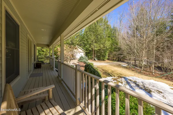 a kitchen with stainless steel appliances granite countertop wooden cabinets a sink and a stove