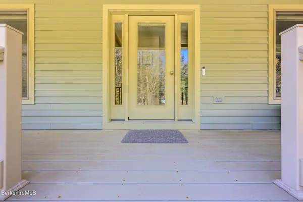 a kitchen with stainless steel appliances granite countertop a refrigerator sink and cabinets