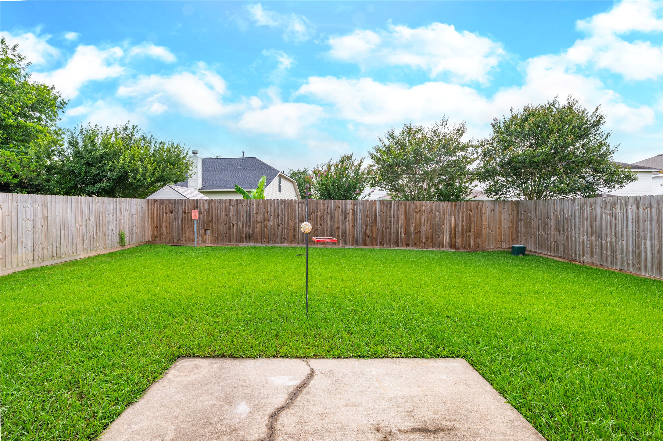 129 Rustic Colony Lane Dickinson, TX 77539 - Photo 26 of 33 Backyard with plenty of space for BBQs and relaxing