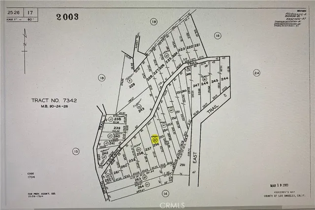 a view of a staircase with white walls