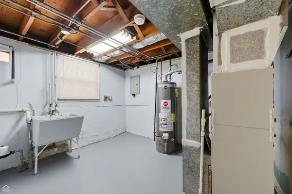 a bathroom with a shower a toilet and sink