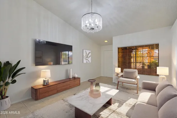 a kitchen with stainless steel appliances granite countertop wooden cabinets stove a sink and dishwasher