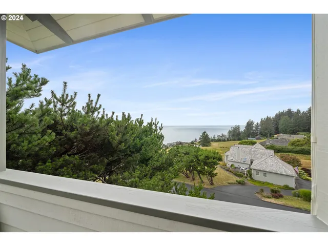 a view of a yard from a balcony