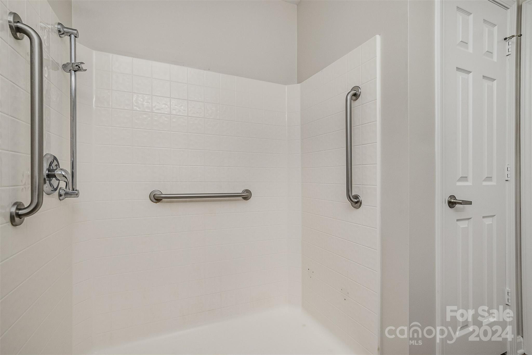 7006 Farm Pond Road Indian Trail, NC 28079 - Photo 20 of 37 a bathroom with a shower