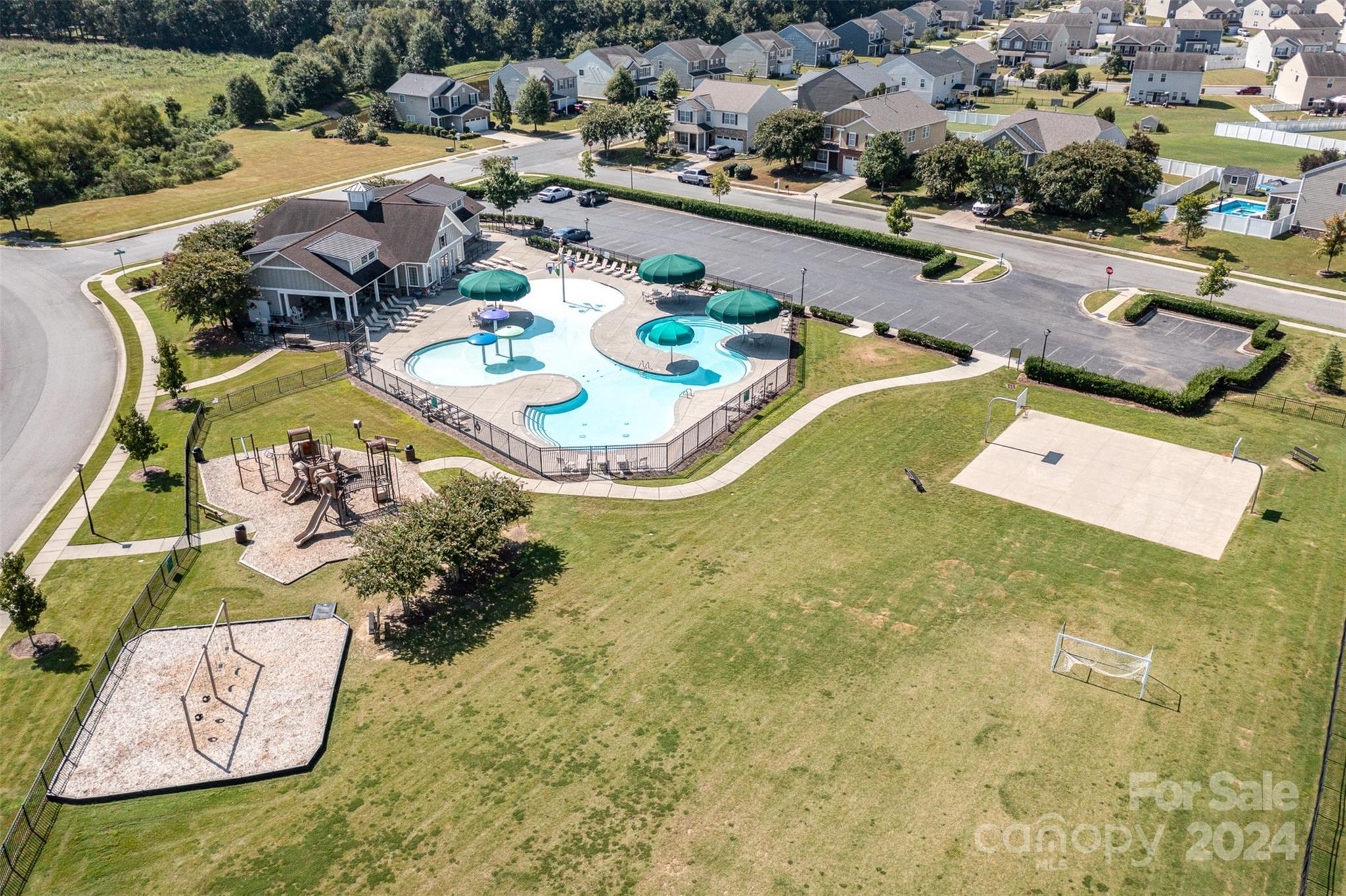 7006 Farm Pond Road Indian Trail, NC 28079 - Photo 2 of 37 an aerial view of a house with outdoor space