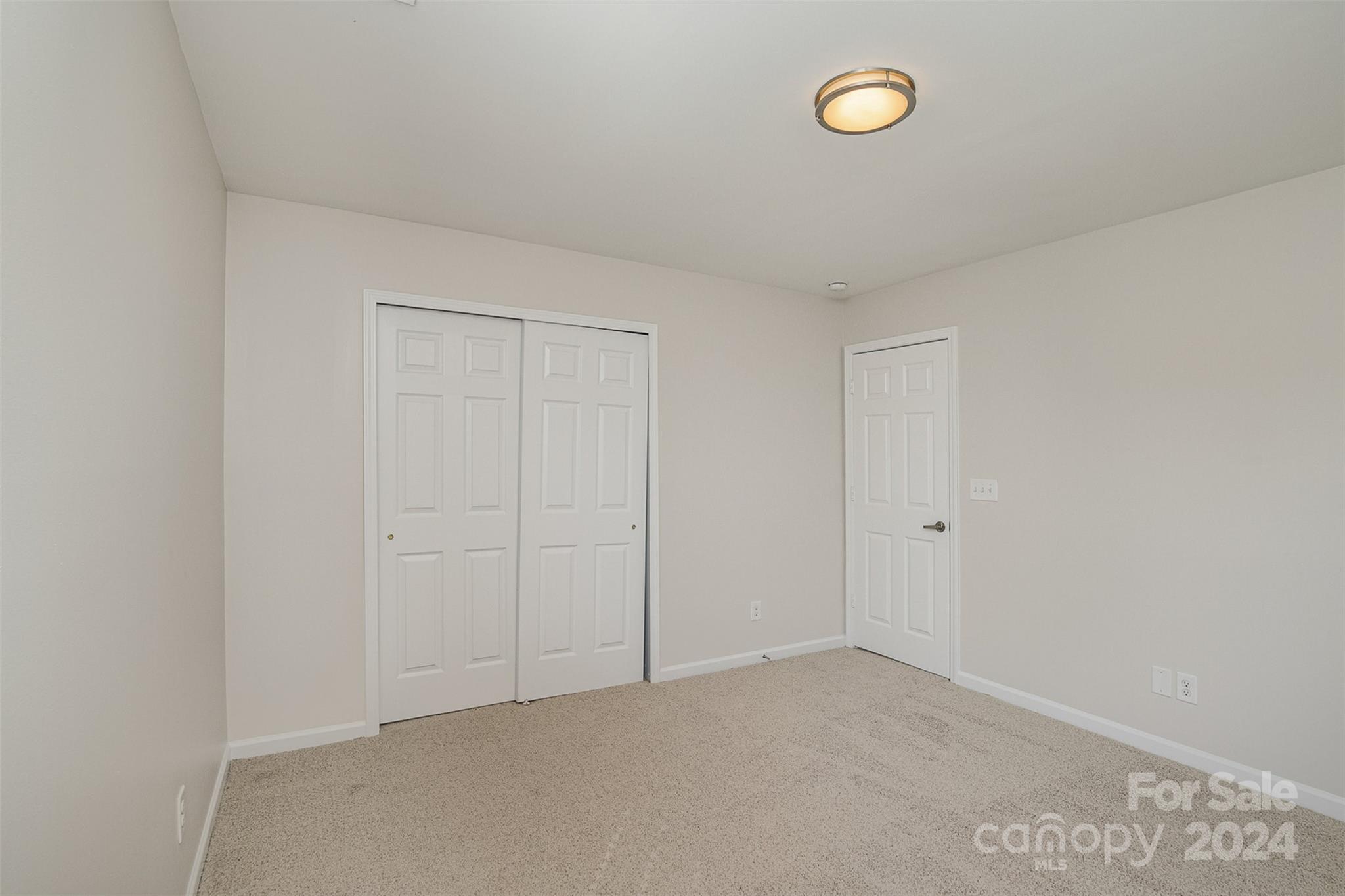 7006 Farm Pond Road Indian Trail, NC 28079 - Photo 23 of 37 a view of an empty room with a window