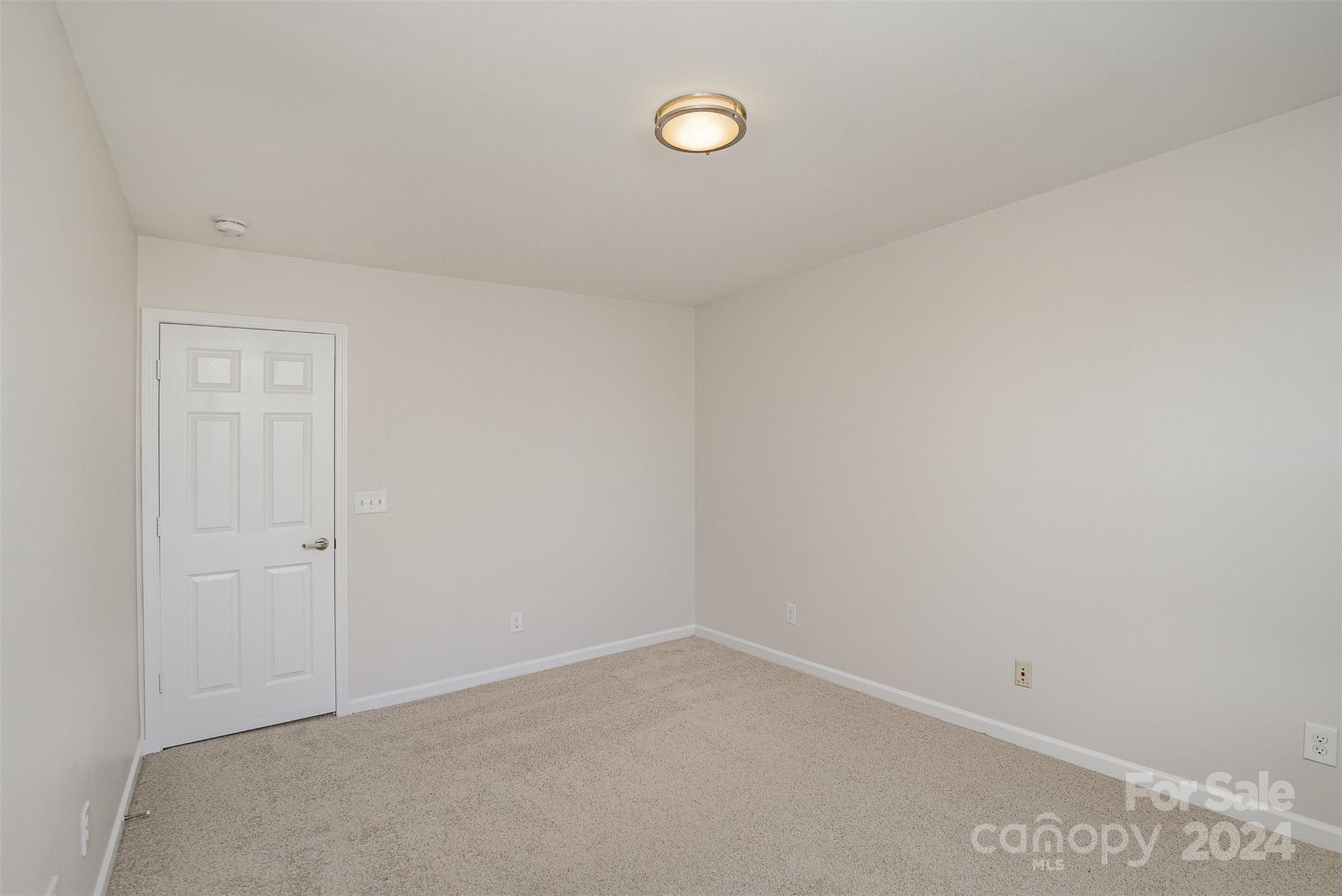 7006 Farm Pond Road Indian Trail, NC 28079 - Photo 25 of 37 a view of an empty room