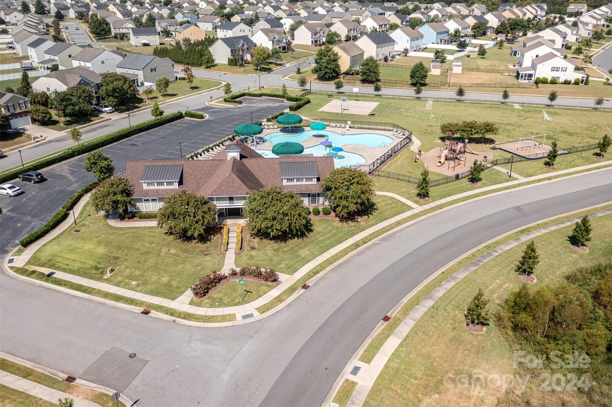 7006 Farm Pond Road Indian Trail, NC 28079 - Photo 35 of 37 view of swimming pool with a garden