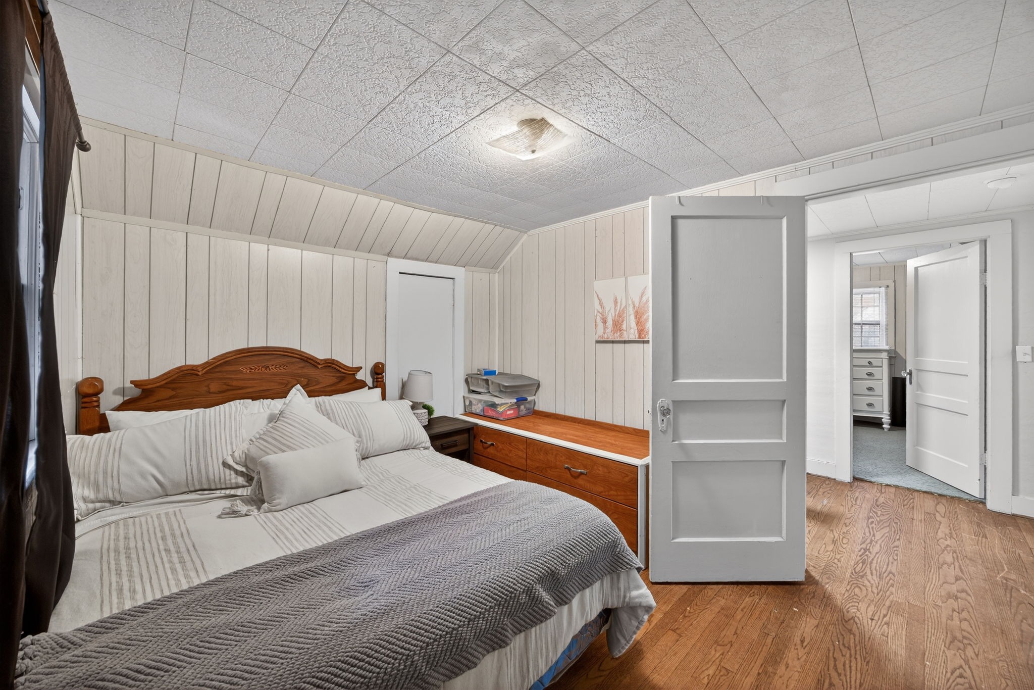 233 Buffalo Valley Road Baxter, TN 38544 - Photo 16 of 34 a bedroom with a bed and a dresser