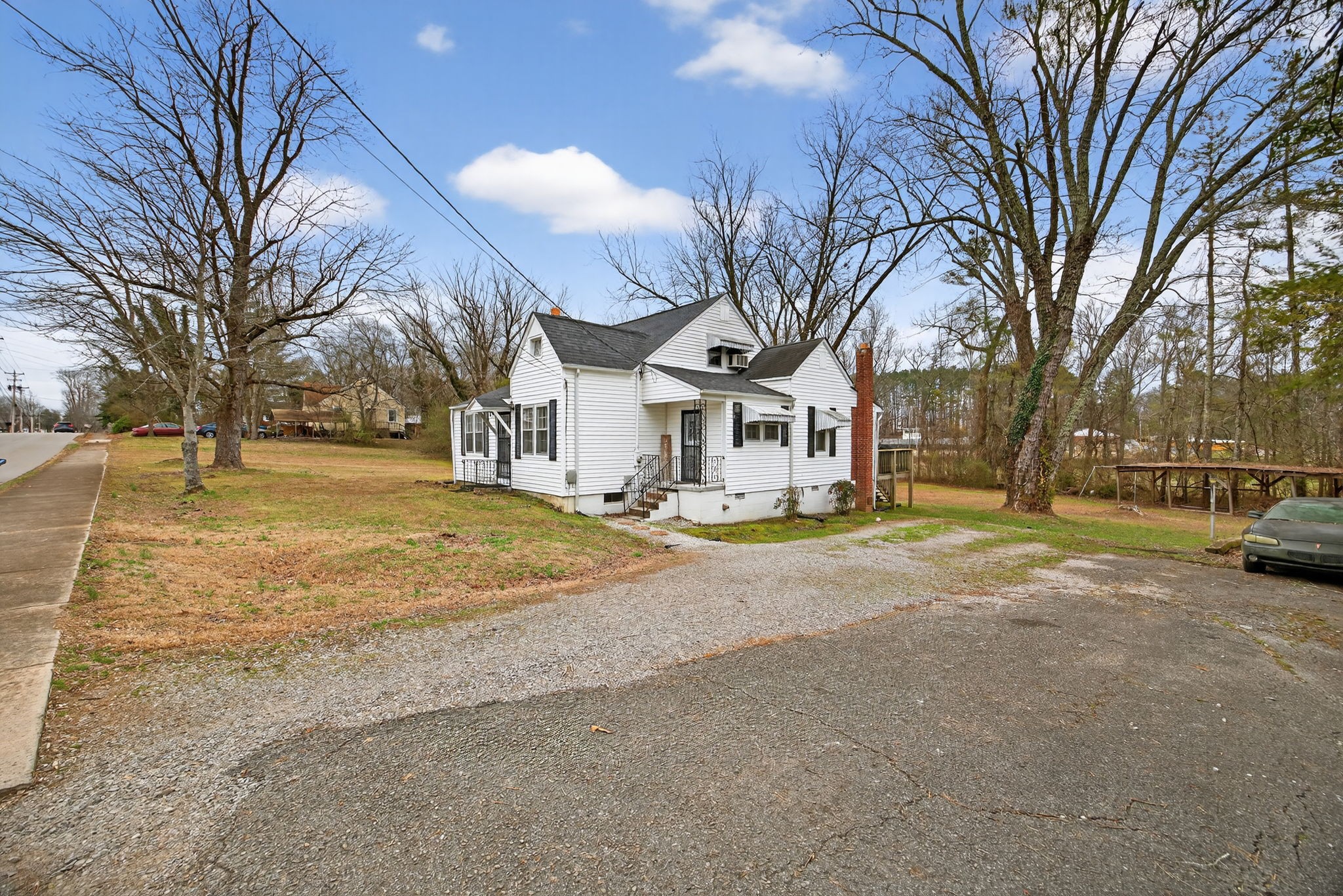 233 Buffalo Valley Road Baxter, TN 38544 - Photo 26 of 34 a view of a house with snow on the road