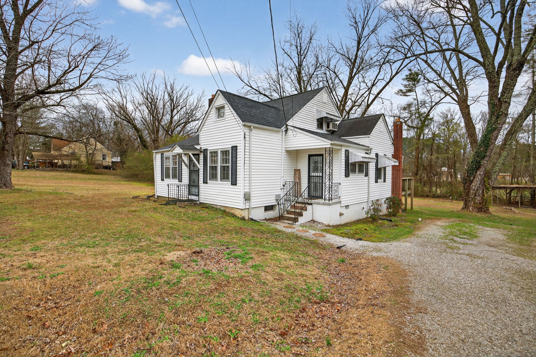 233 Buffalo Valley Road Baxter, TN 38544 - Photo 27 of 34 a front view of a house with yard and green space