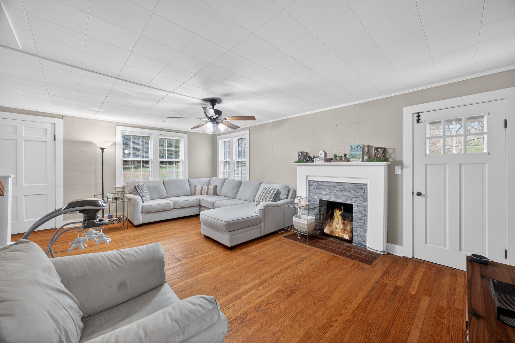 233 Buffalo Valley Road Baxter, TN 38544 - Photo 4 of 34 a living room with furniture and a fireplace