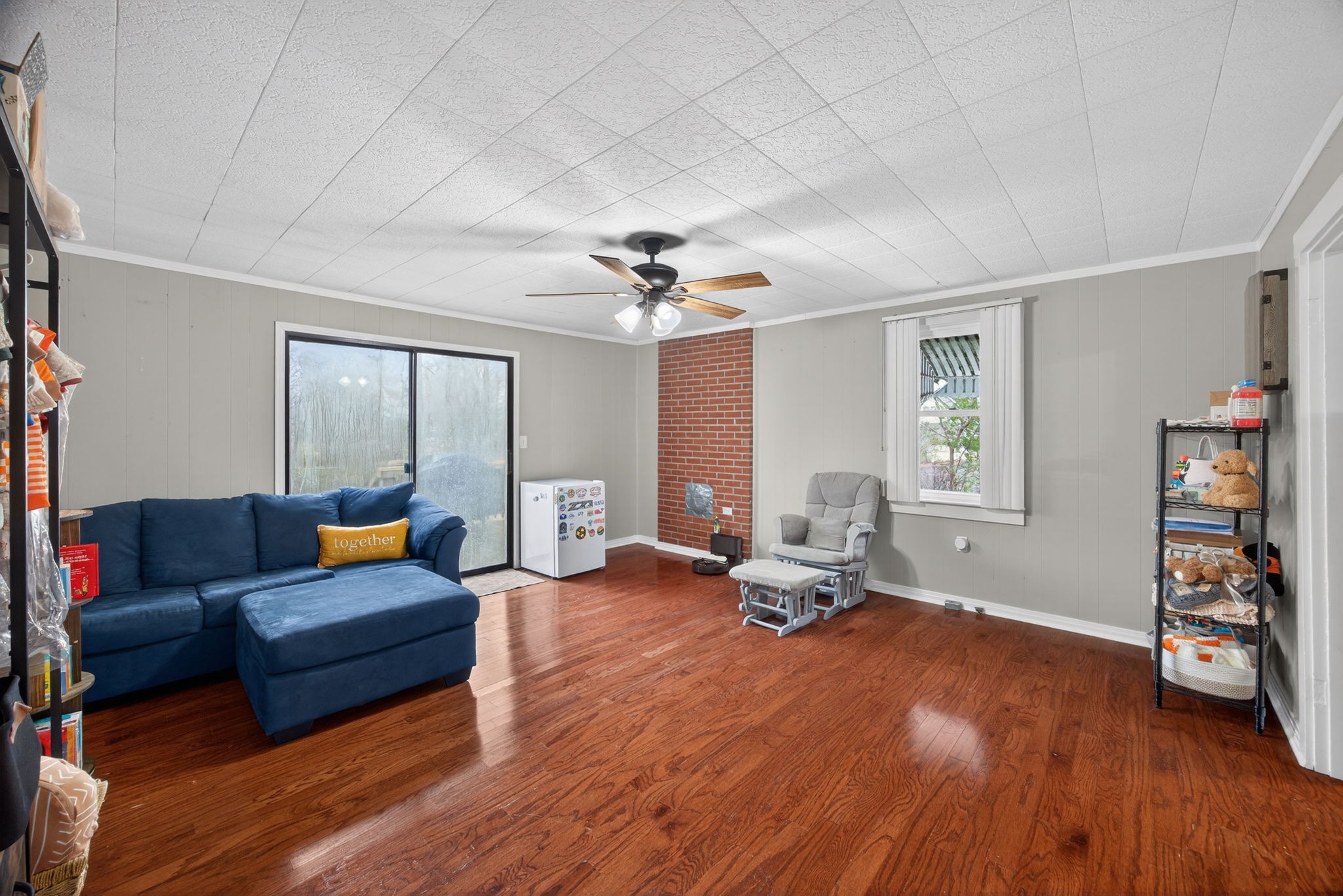 233 Buffalo Valley Road Baxter, TN 38544 - Photo 10 of 34 a living room with furniture and a wooden floor