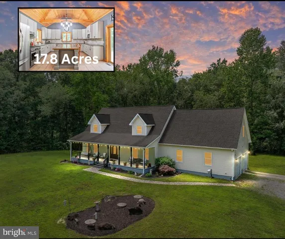 a view of a house with a big yard