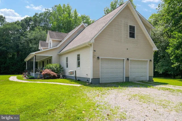 a view of a garden with a lake