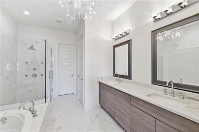 223 16th Street Northwest, Unit 6 Atlanta, GA 30363 - Photo 30 of 32 a bathroom with a double vanity sink mirror and double