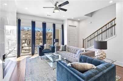 223 16th Street Northwest, Unit 6 Atlanta, GA 30363 - Photo 3 of 32 a living room with furniture and large windows