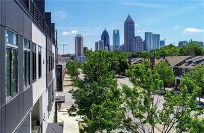 223 16th Street Northwest, Unit 6 Atlanta, GA 30363 - Photo 32 of 32 a view of a city with tall buildings