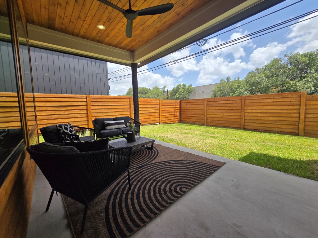 5301 Grover Avenue Austin, TX 78756 - Photo 13 of 40 Back covered porch with lighting, and a ceiling fan to ward off any bugs in the evening or provide a breeze on hot summer days.