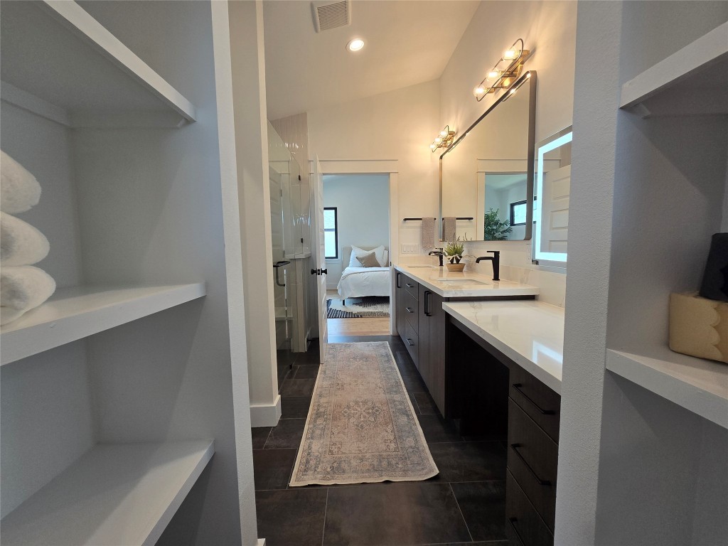 5301 Grover Avenue Austin, TX 78756 - Photo 24 of 40 Lots of built in storage in the primary bath.