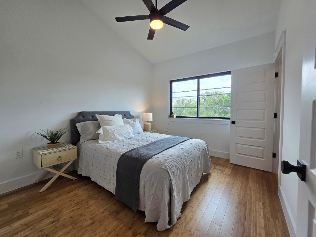 5301 Grover Avenue Austin, TX 78756 - Photo 29 of 40 Bedroom featuring light wood-style floors, vaulted ceiling, and ceiling fan