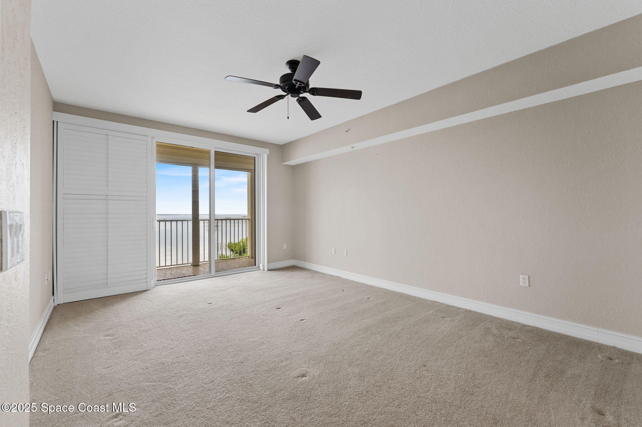 480 Sail Lane, Unit 204 Merritt Island, FL 32953 - Photo 11 of 32 a view of an empty room with a window