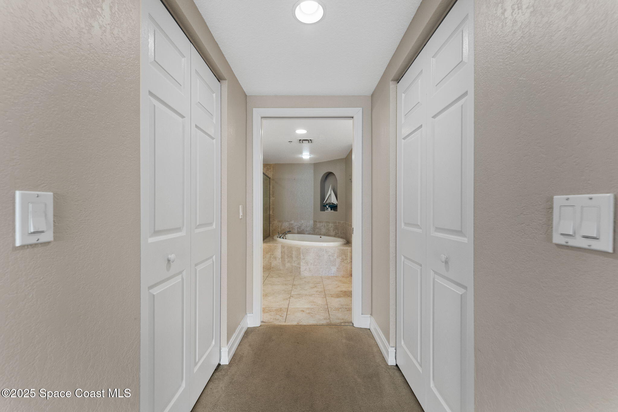 480 Sail Lane, Unit 204 Merritt Island, FL 32953 - Photo 13 of 32 a view of a hallway