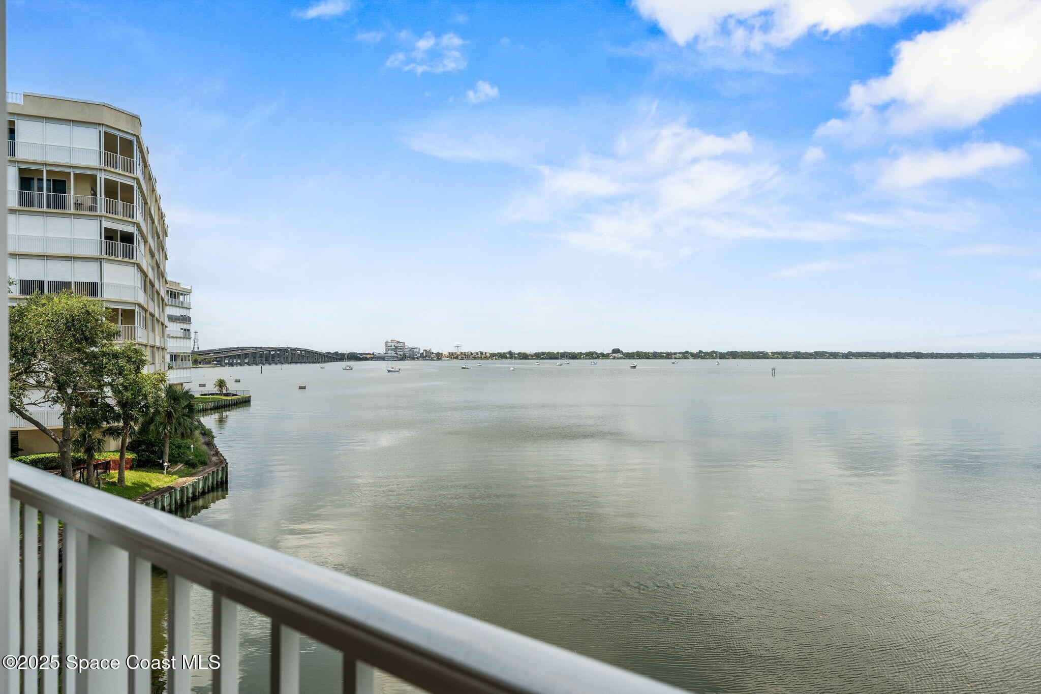 480 Sail Lane, Unit 204 Merritt Island, FL 32953 - Photo 22 of 32 a view of a lake from a balcony