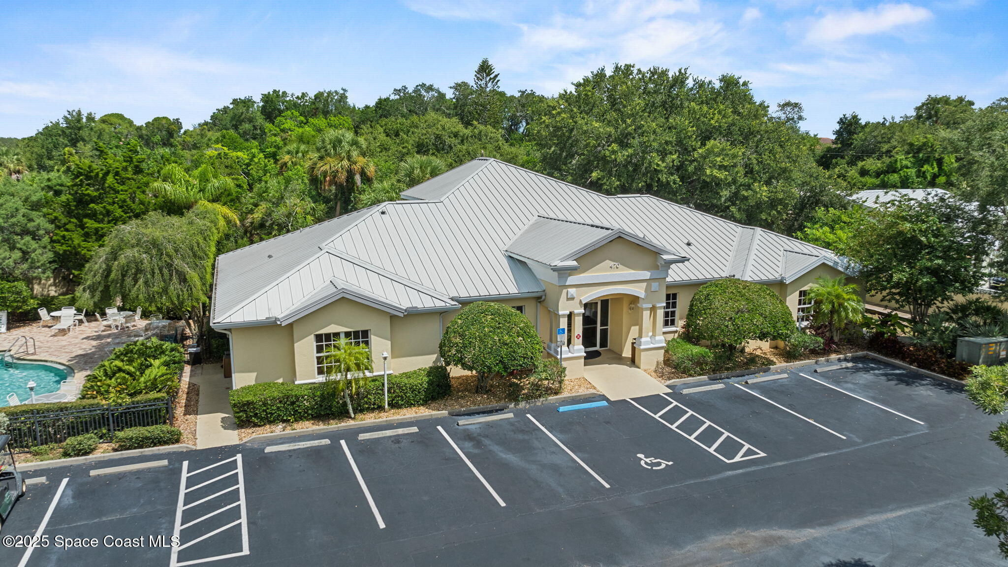480 Sail Lane, Unit 204 Merritt Island, FL 32953 - Photo 25 of 32 a view of a house with a yard