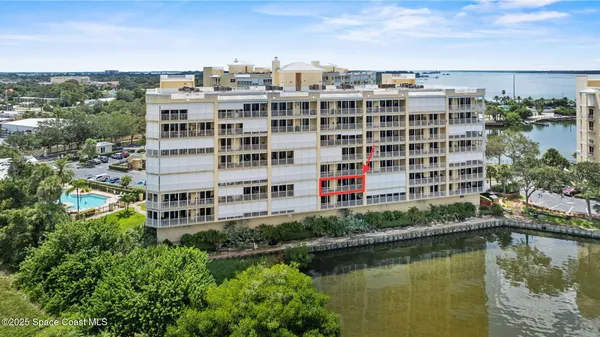 a view of a lake with building in front of it