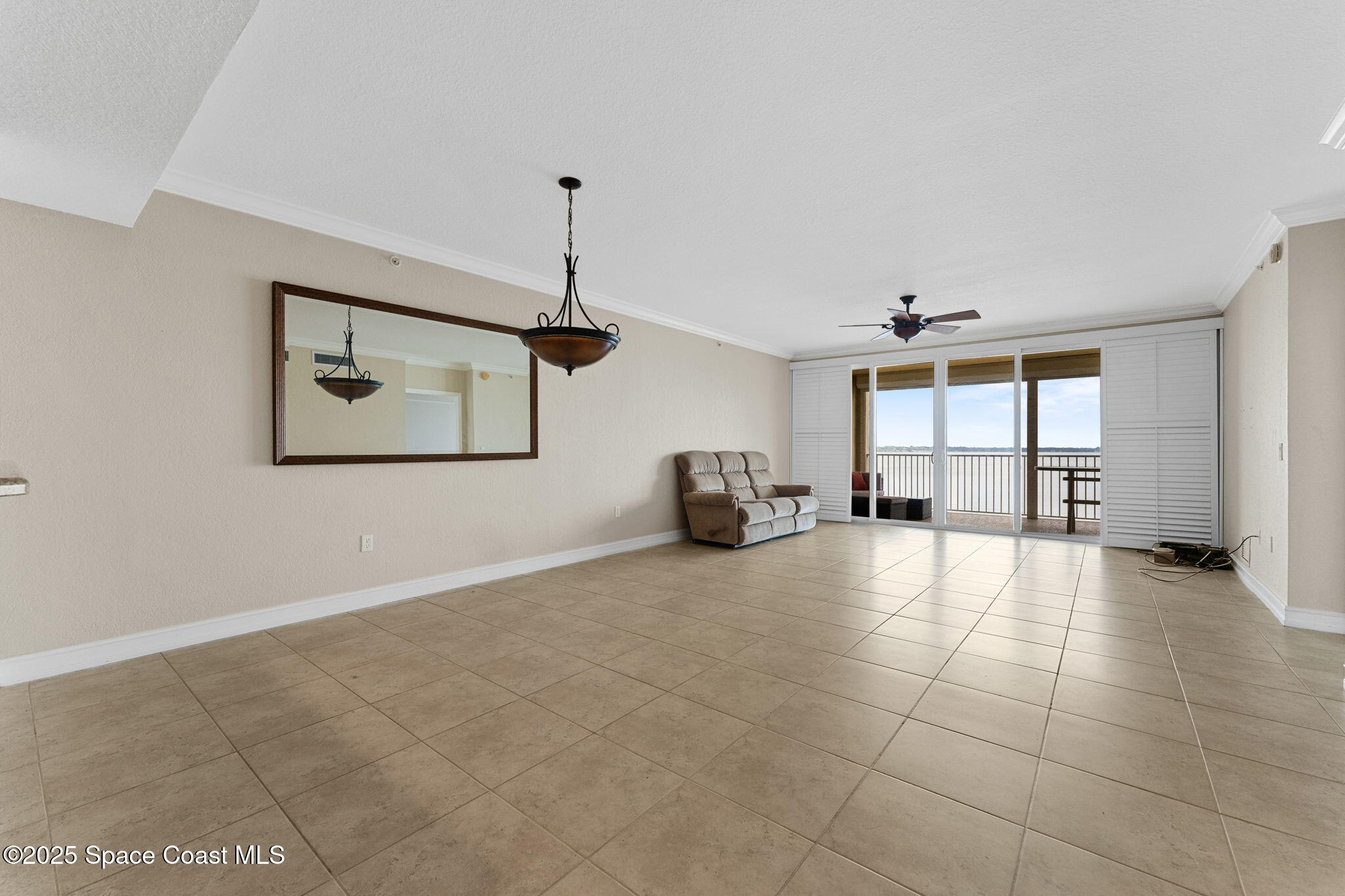 480 Sail Lane, Unit 204 Merritt Island, FL 32953 - Photo 10 of 32 a view of a livingroom with a furniture and window