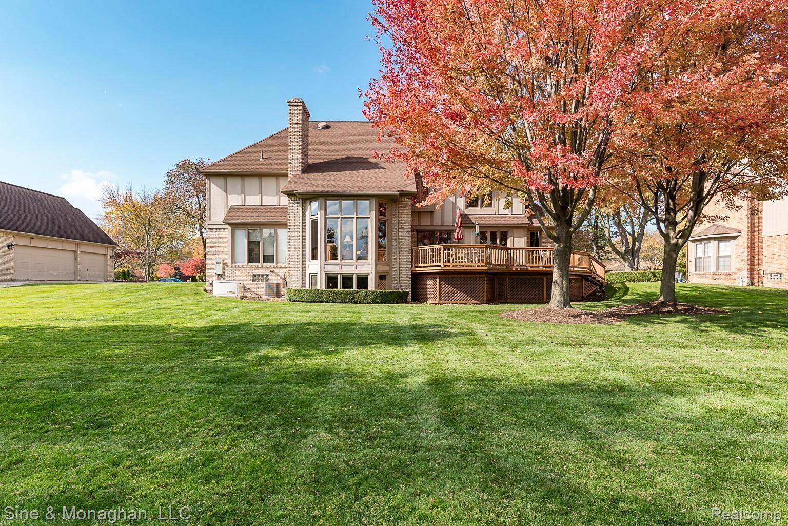 4906 Rivers Edge Drive Troy, MI 48098 - Photo 51 of 60 Expansive deck, whole house generator