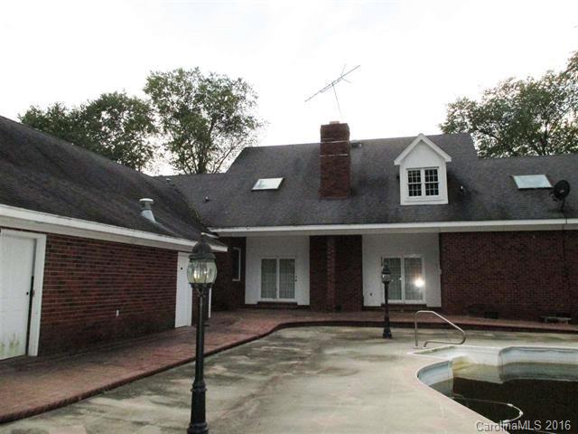2741 South Potter Road Heath Springs, SC 29058 - Photo 3 of 24 a front view of a house with plants