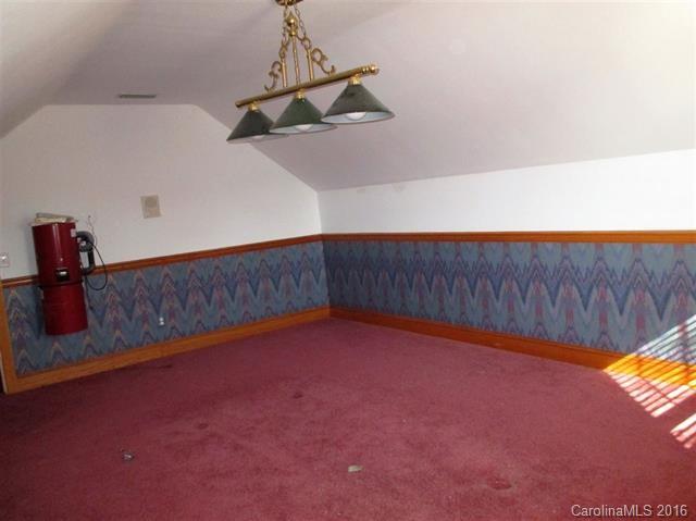 2741 South Potter Road Heath Springs, SC 29058 - Photo 22 of 24 a view of a room with a ceiling fan and wooden floor