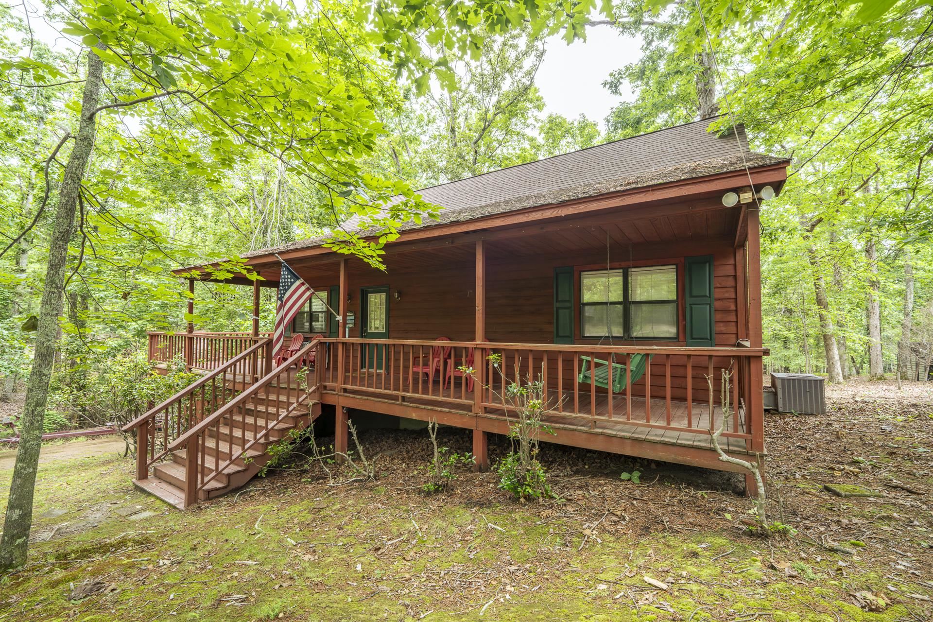 405 Murray Lane Counce, TN 38326 - Photo 36 of 36 a view of a house with a wooden deck and a yard