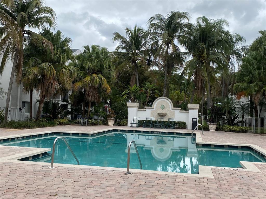 5780 Rock Island Road, Unit 367 Tamarac, FL 33319 - Photo 10 of 13 a house view with a garden space
