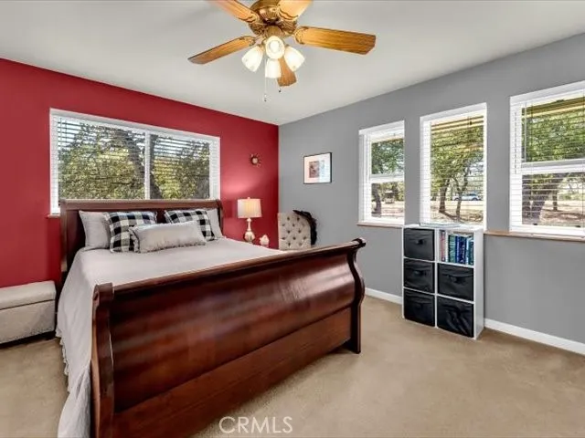 a bathroom with a sink vanity and mirror