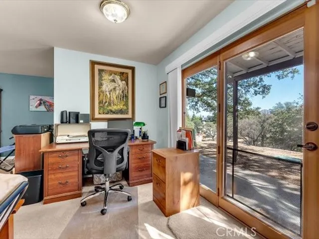 a view of a deck with table and chairs potted plants with wooden floor