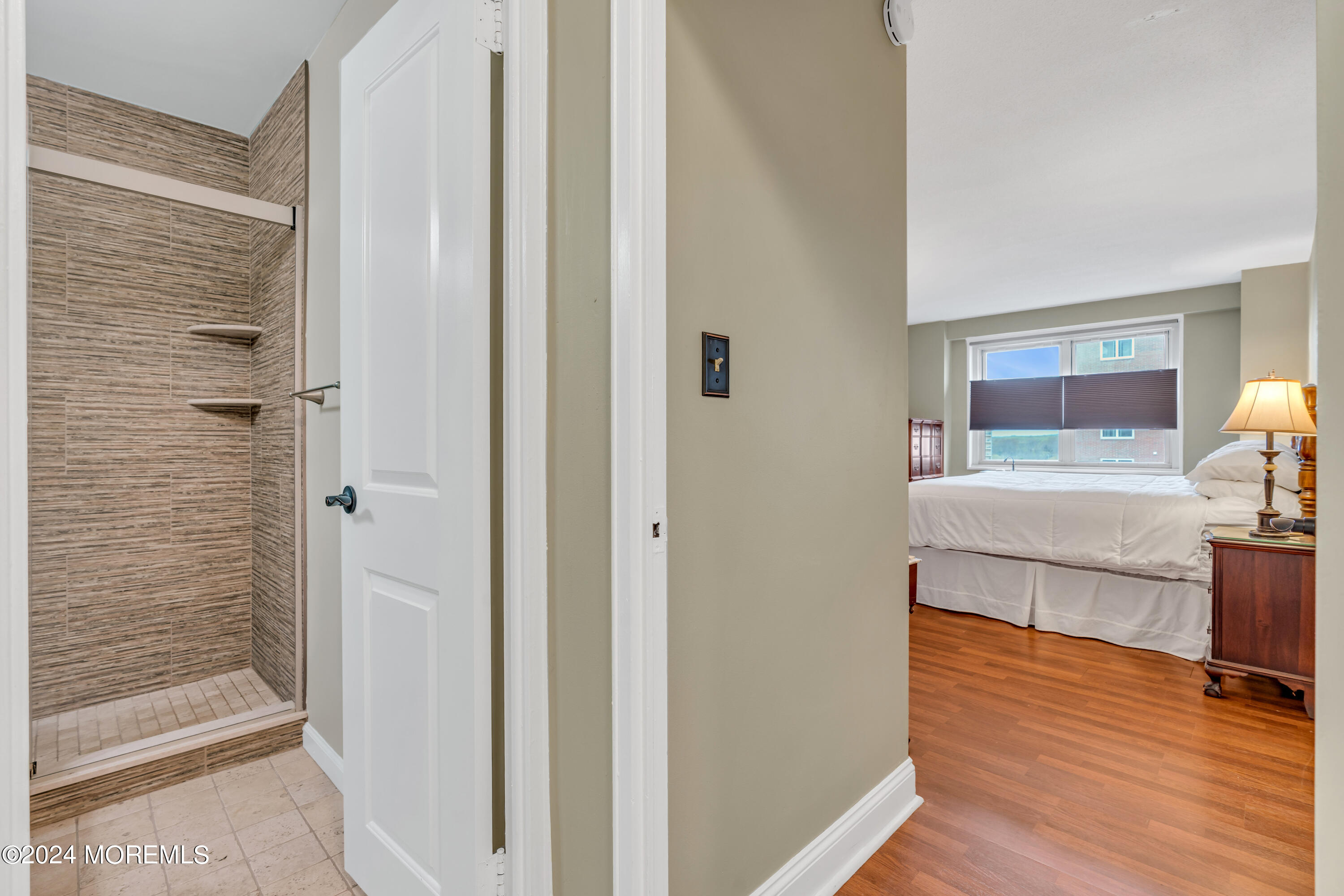 28 Riverside Avenue, Unit 7J Red Bank, NJ 07701 - Photo 16 of 25 a view of a bathroom from the hallway