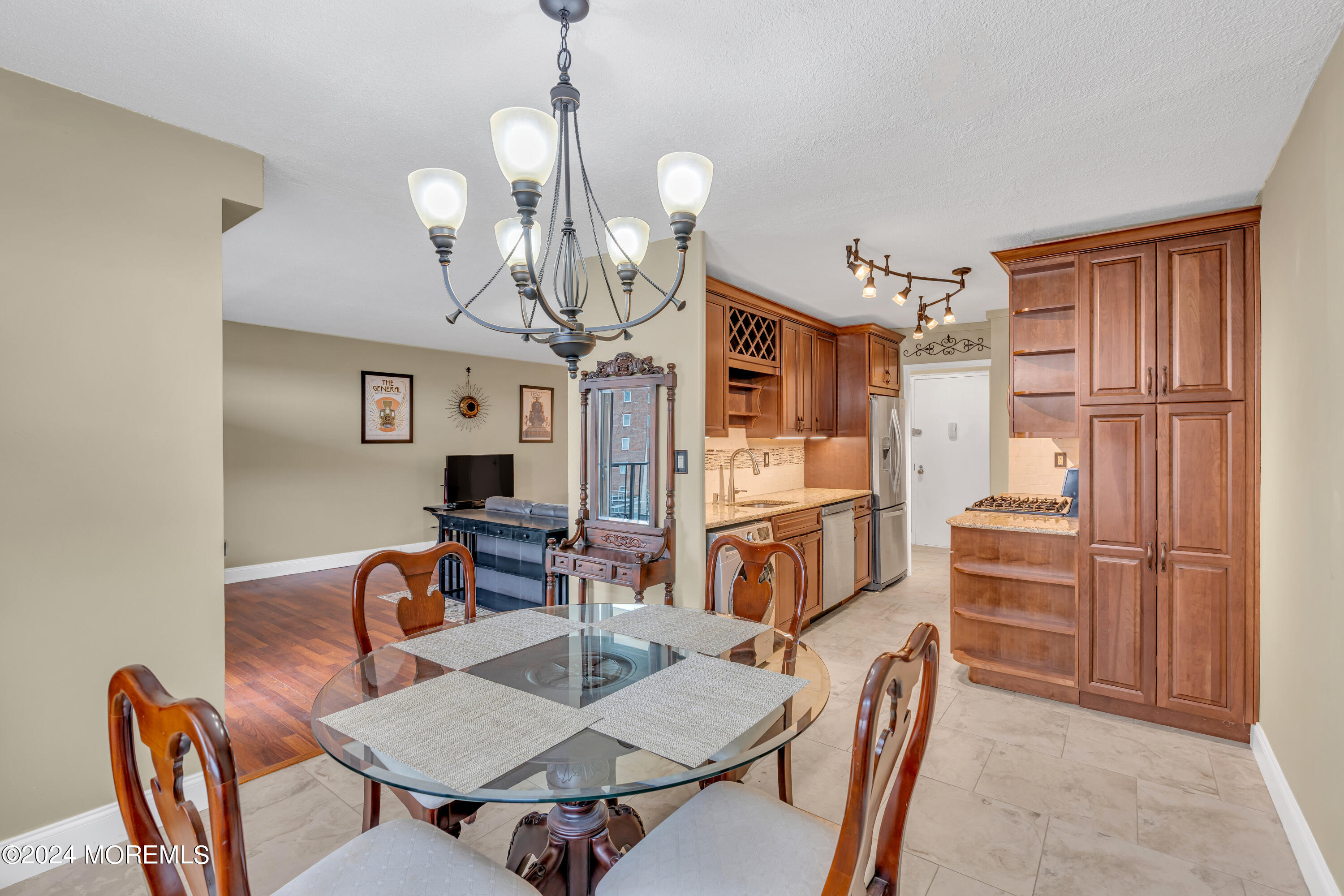 28 Riverside Avenue, Unit 7J Red Bank, NJ 07701 - Photo 8 of 25 a view of a dining room with furniture