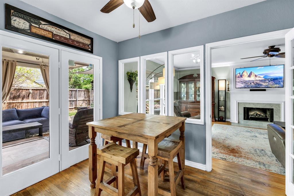 720 Bridget Way Hurst, TX 76054 - Photo 11 of 40 a view of a dining room with furniture window and wooden floor
