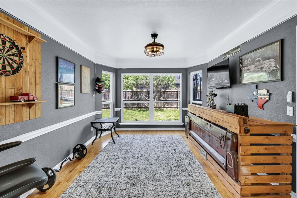 720 Bridget Way Hurst, TX 76054 - Photo 13 of 40 a large living room with a large window