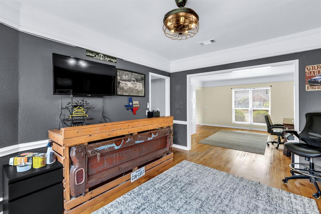 720 Bridget Way Hurst, TX 76054 - Photo 14 of 40 a room with furniture and a flat screen tv