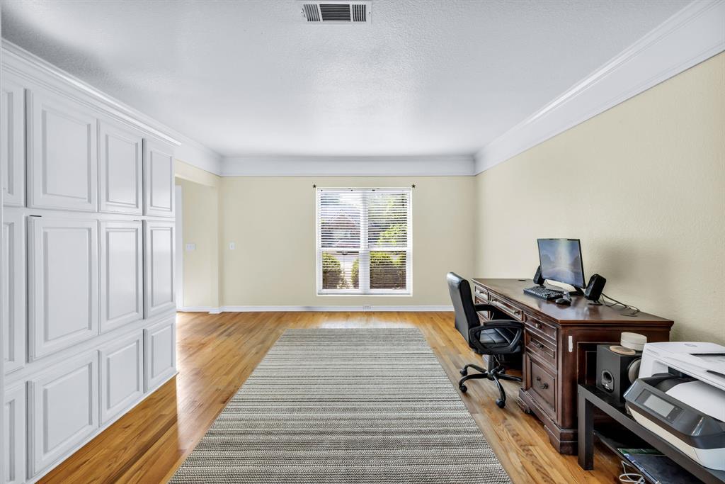 720 Bridget Way Hurst, TX 76054 - Photo 15 of 40 a view of a workspace with furniture and a window